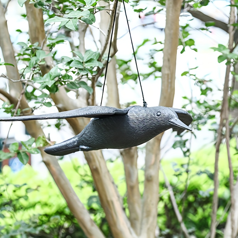 Image of Lifelike Flying Crow Garden Decor - Durable, Fade-resistant Plastic, Easy To Hang, Perfect For Outdoor Spaces, 21.85x15.35 Inches