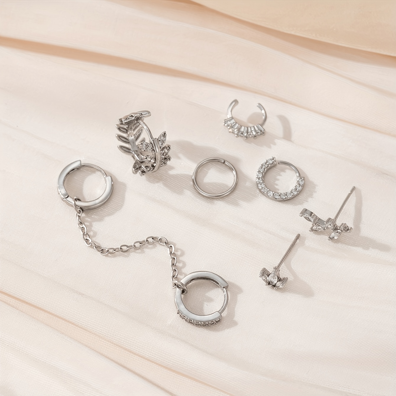TEMU Ensemble de 7 boucles d'oreilles tendance pour femme, clous d'oreilles feuille et clips de C et luxueux en synthétique, pour festivals de