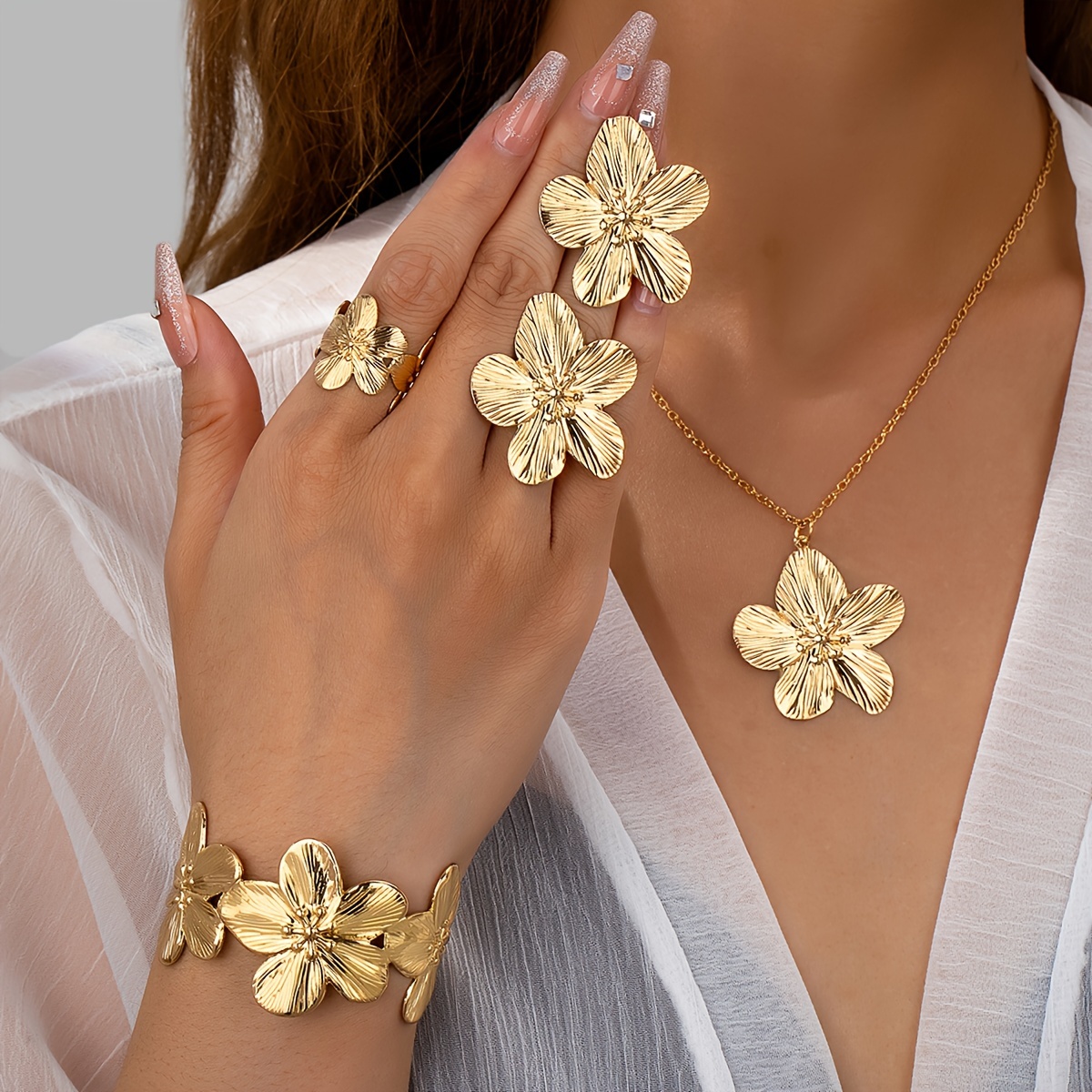 

Ensemble de Bijoux Floral Élégant 5 Pièces pour Femme - des Boucles d'Oreilles Clous, une Bague, un Bracelet & un Collier | Design Chic & Simple