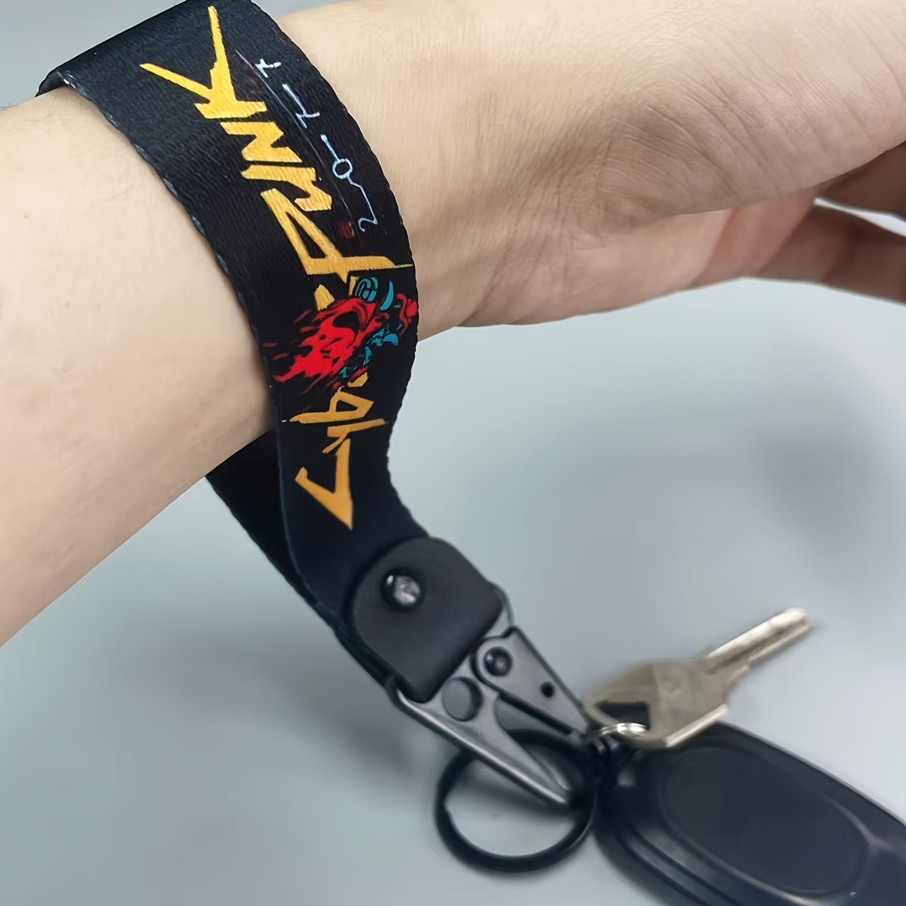 Image of Flame Skull Pattern Key Chain Wristband Key Chain Anti-loss Key Lanyard High-density Ribbon Combined With Pu Link | Strong And Wear-resistant Practical Key Chain Lanyard Clothes Daily Matching