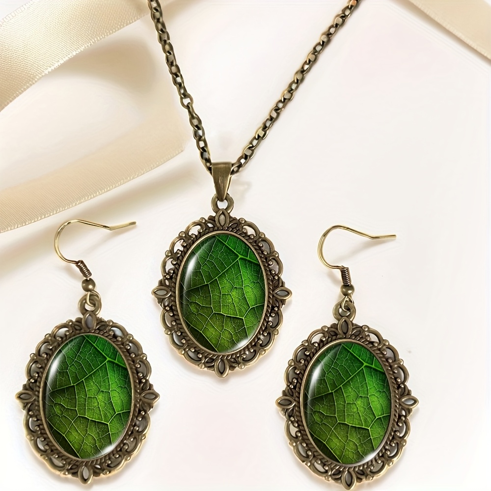 E-shop 3-teiliges Set Halskette Ohrringe mit grünen Blattadern, ovaler Glas-Cabochon-Schmuck