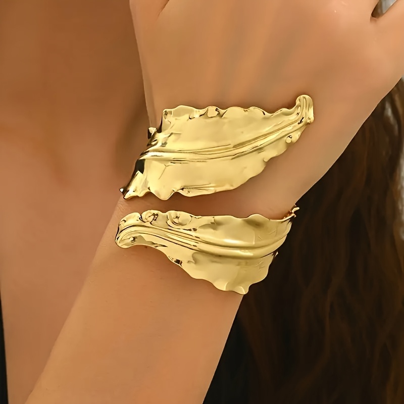 Image of Elegant Golden Geometric Leaf Open Cuff Bracelet For Women - Fashionable Daily Wear And Party Accessory, Adjustable Iron Bangle, Jewelry | Statement Piece | Abstract Leaf Shape