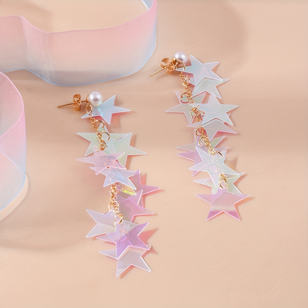 TEMU Boucles d'oreilles étoile à branches transparentes avec un design élégant et luxueux, mettant en valeur un style unique et créatif