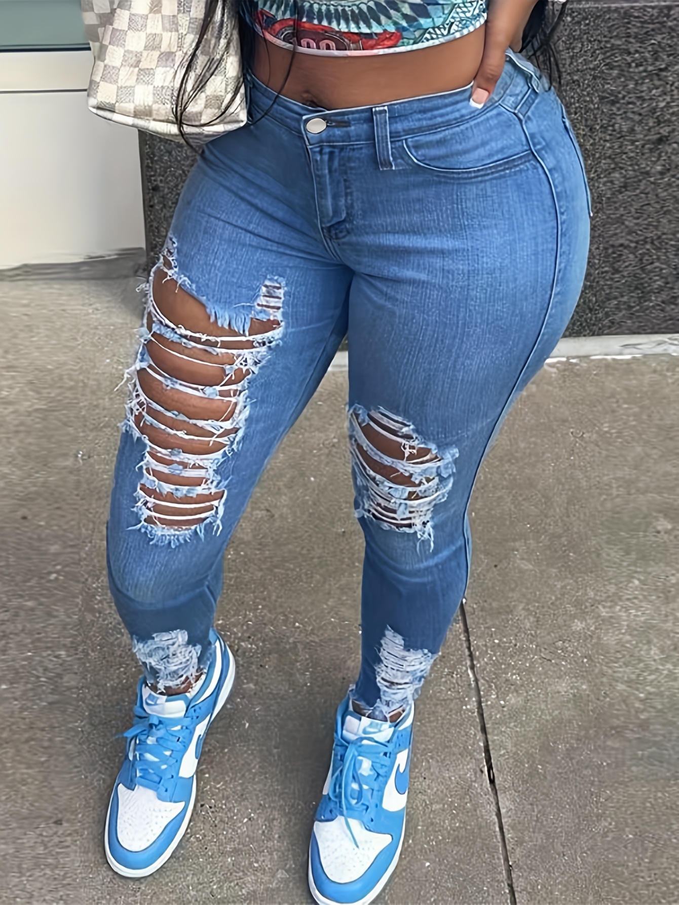 Jeans skinny strappati azzurri da uomo
