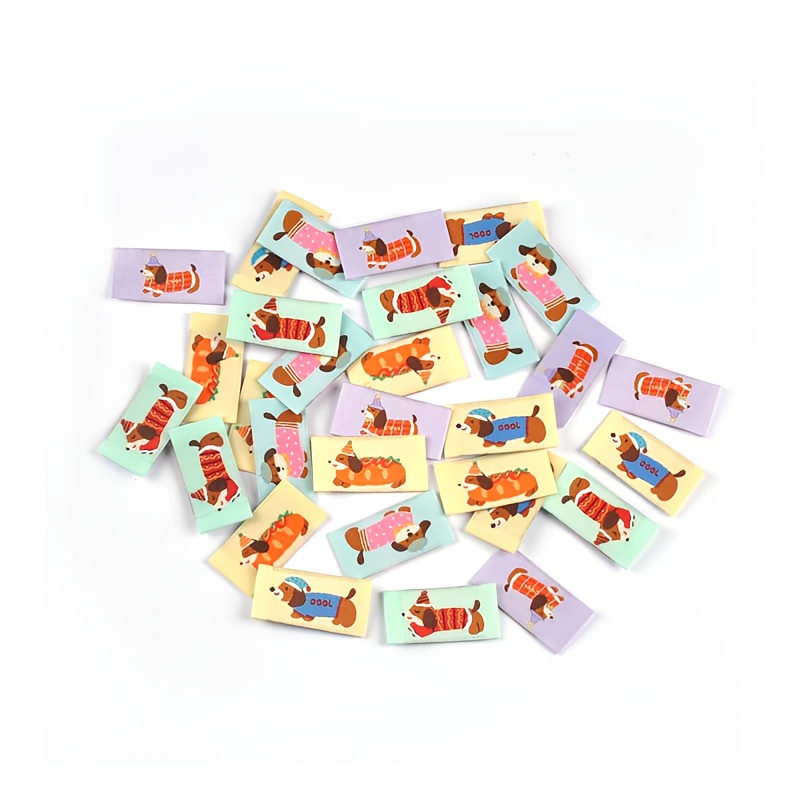 50pcs 2x4cm Puppy Pattern Random Mixed Cloth Label Edge Fold Fabric Tag Sticker Hand Sewing Bag Scarf Additions No Backing