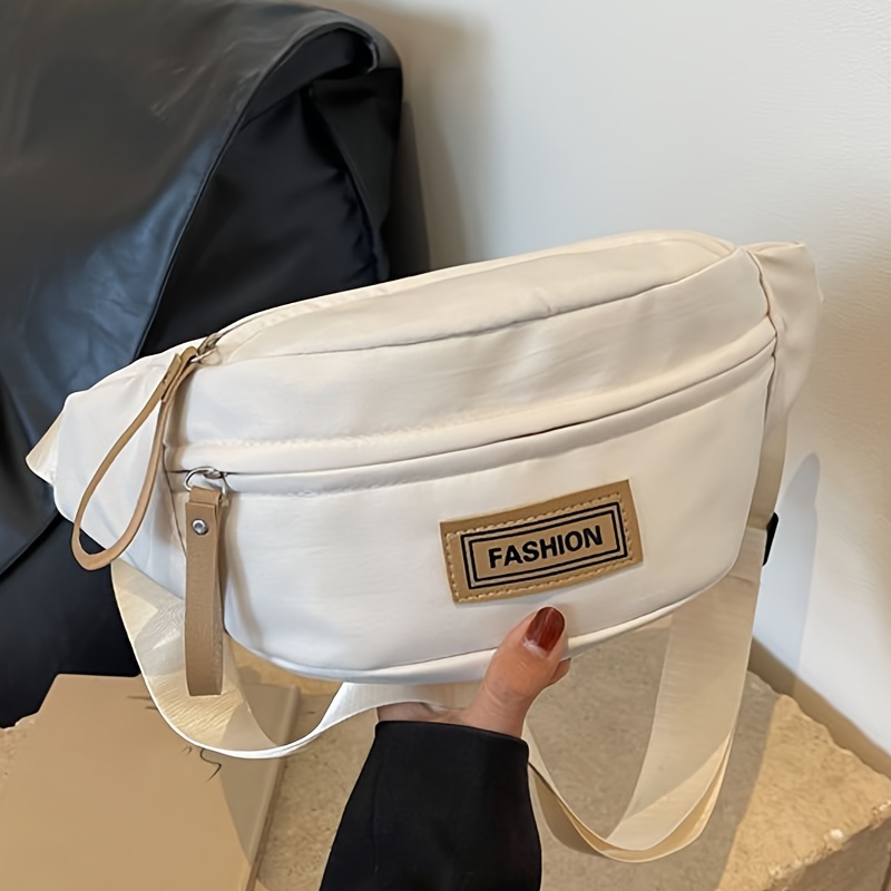 

Sac de poitrine tendance en forme de boulette blanche pour les sorties, le vélo et le skateboard, sac à bandoulière unique avec fermeture éclair portable en forme de bateau pour les garçons cool.