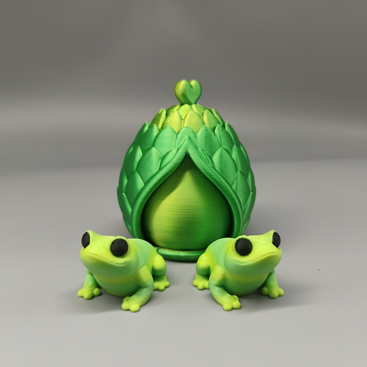 TEMU Huevos Giratorios con Carcasa Verde y Figura de Rana Pequeña - Adorno de Figura - Lindo y Encantador - Único y , Ideal para Adornos del Hogar -