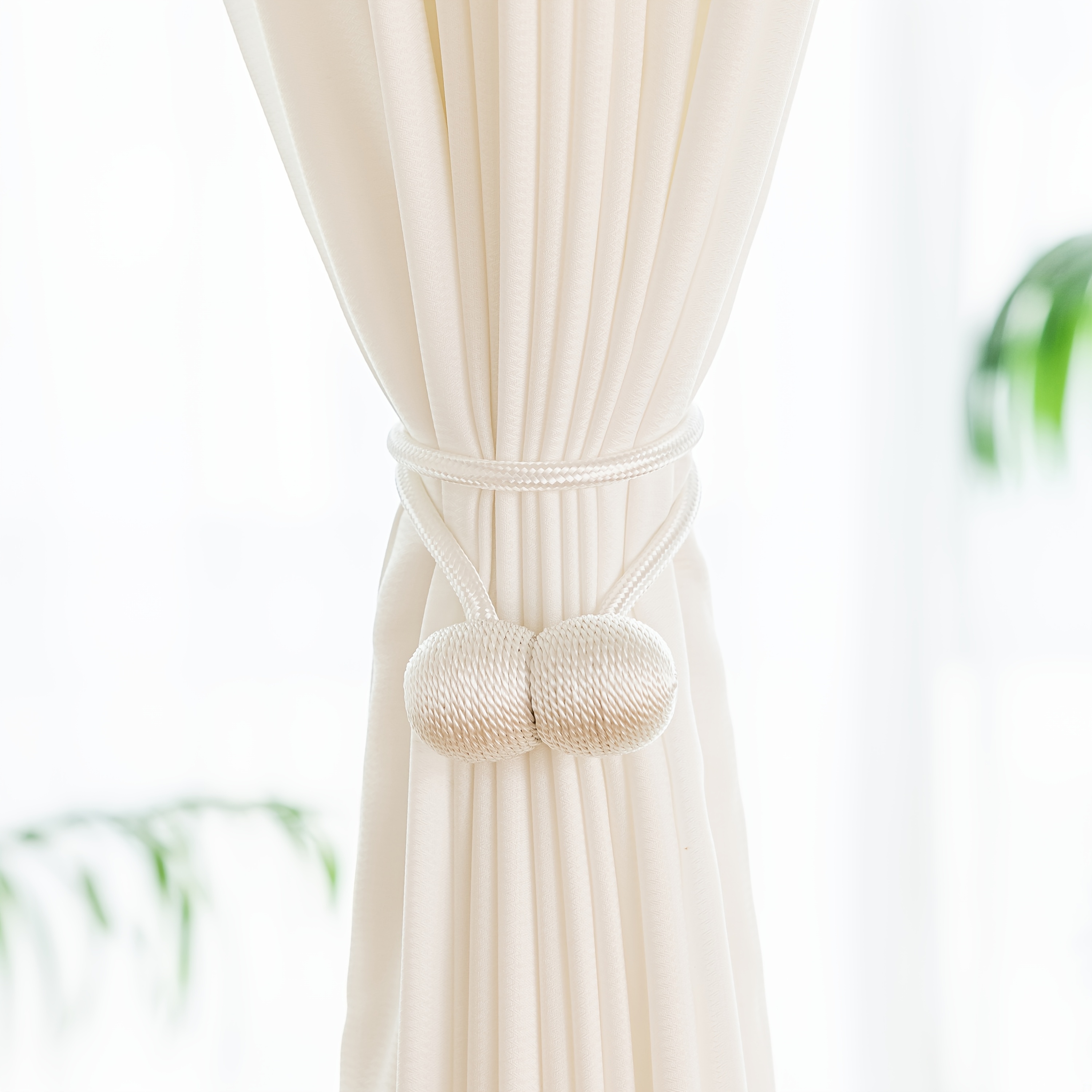 A Set of Two Modern Minimalist Magnetic Curtain Ties Is on, Featuring Thicker Twisted Ropes And Flexible Magnetic Ties. They Are Durable, Easy to Install, And Do Not Require Drilling, Making Them Perfect for Bedroom And Living Room Decor