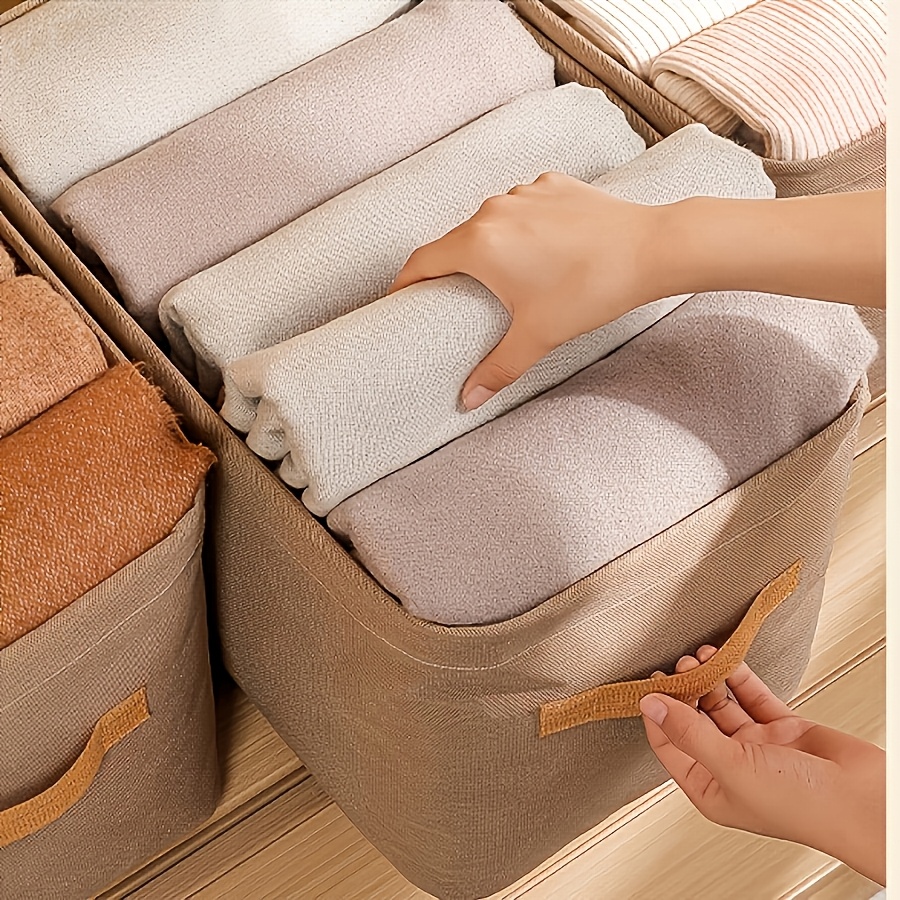 

A Multifunctional Non-woven Fabric Storage Box For Clothes, Featuring Handles, Lightweight Organizer - In Gray And Khaki.