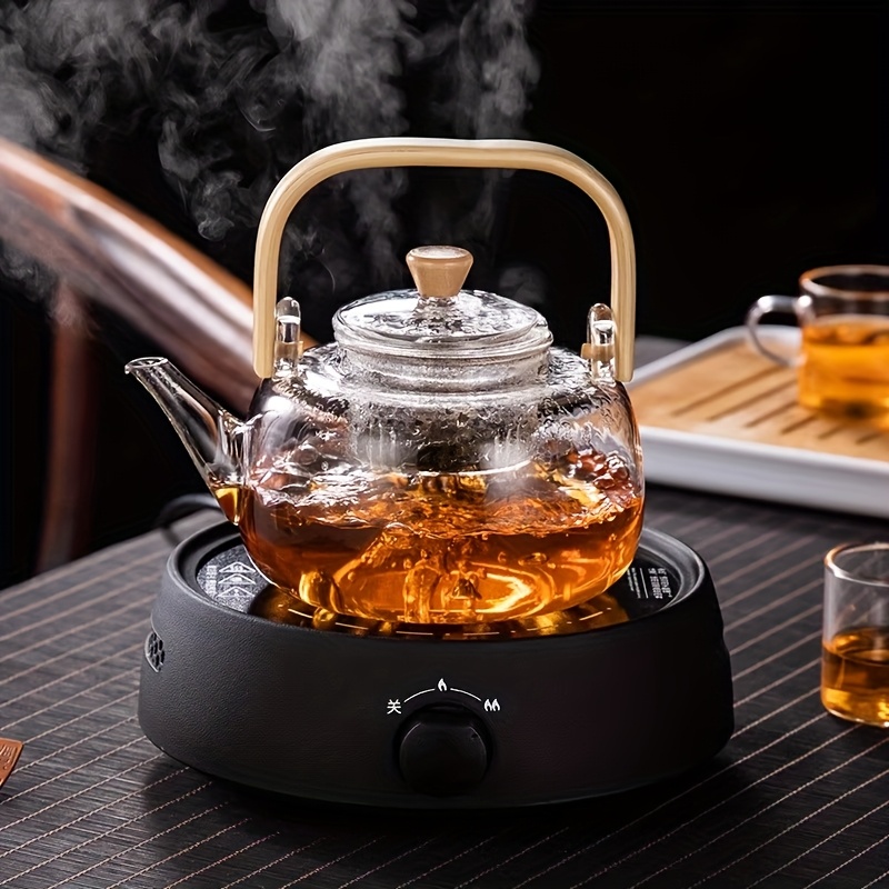 1 db 950 ml-es üveg teáskanna, alkalmas tea főzésére, használható nyitott láng fölé, átlátszó kávésüveg, bambusz fogantyú virágos teához, vízforraló elektromos kerámia tűzhelyre, teáskanna délutáni teához Termék részletei 1