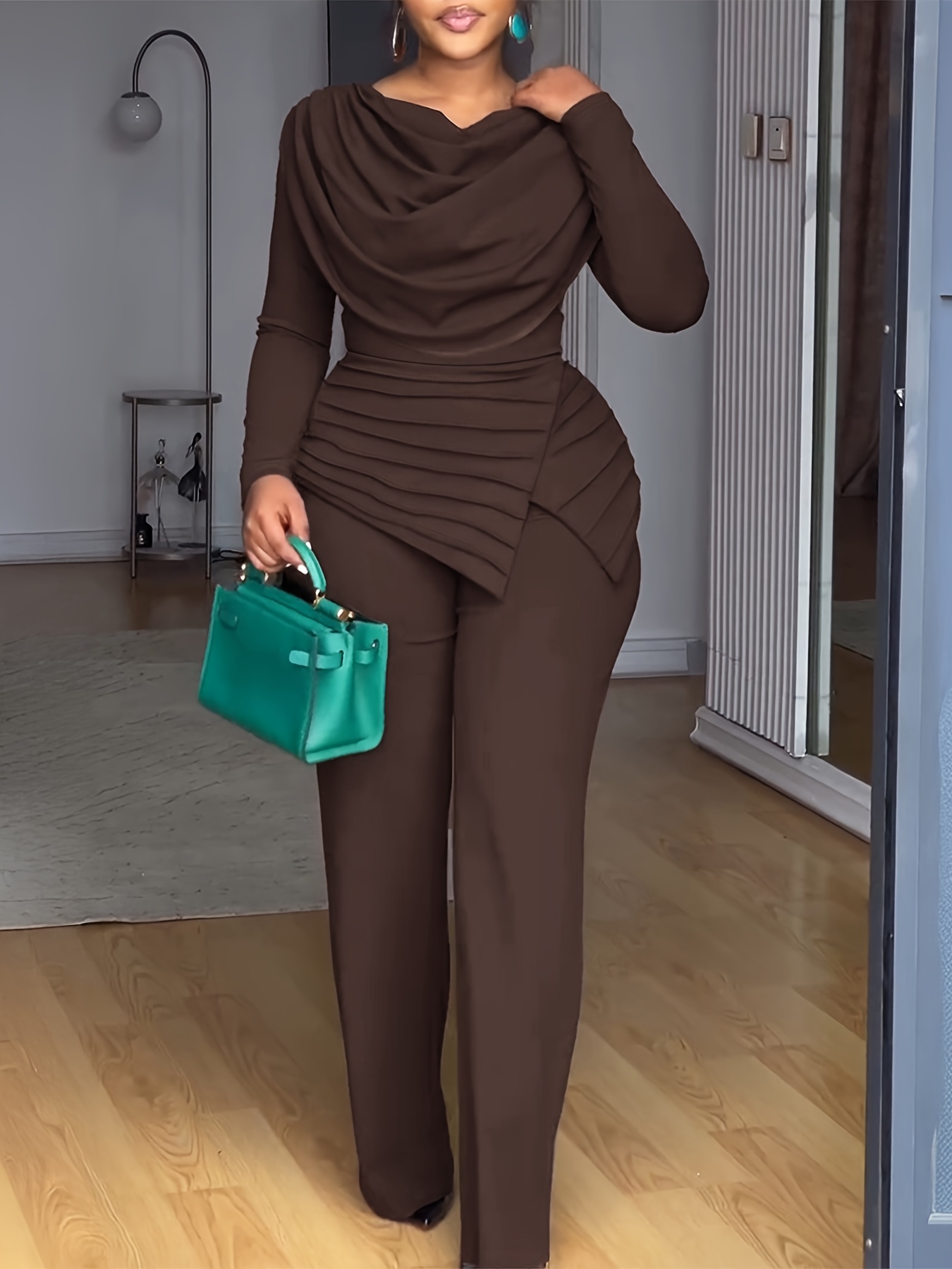 A Long-Sleeved Top with a Gathered Design And a Waist-Cinching Feature, Paired with Wide-Leg Jumpsuits