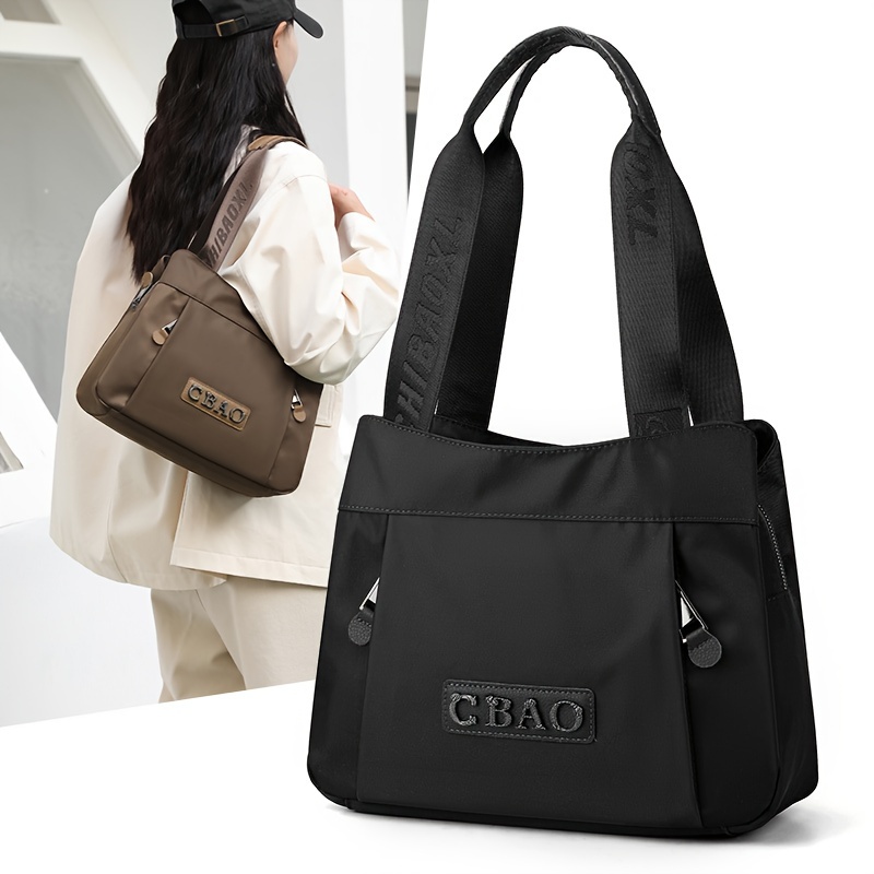 

Sac à Épaule Élégant en Tissu Oxford Noir avec Plusieurs Poches - Sac à Main Spacieux et Chic pour Femme, pour un et les