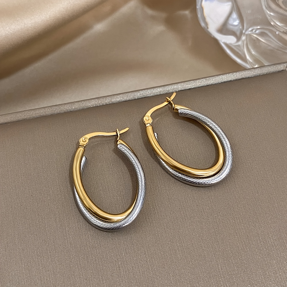 E-shop Set mit 2 einzigartigen U-förmigen Ohrringen für Damen, mit einem einfachen und stilvollen Design aus Edelstahl. Diese luxuriösen Accessoires