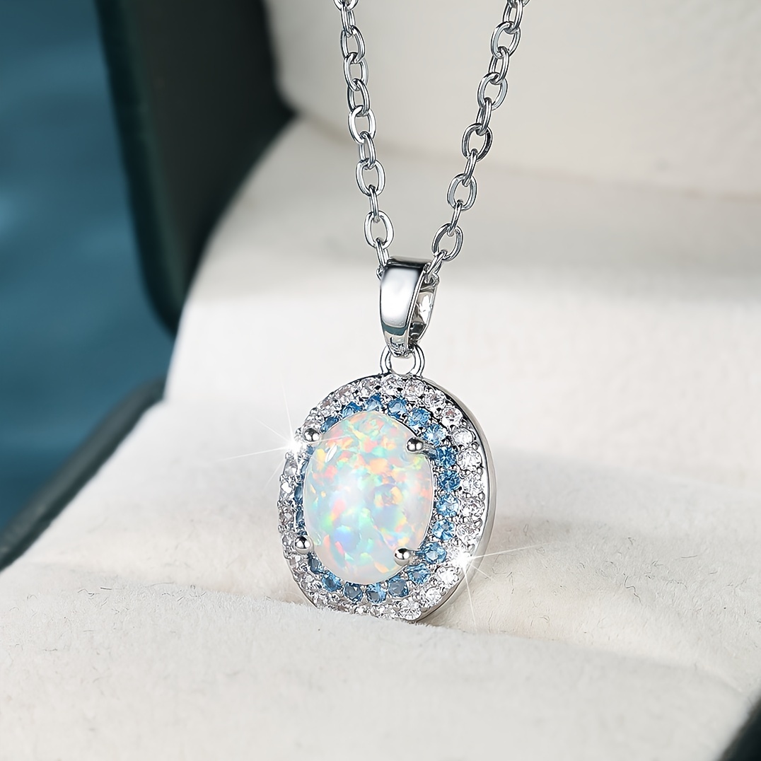 

Elegant Bohemian Oval Opal Pendant Necklace With Sea-blue Zirconia Stones, Luxurious Women's Clavicle Chain, Blingbling High-end Jewelry Gift For Her