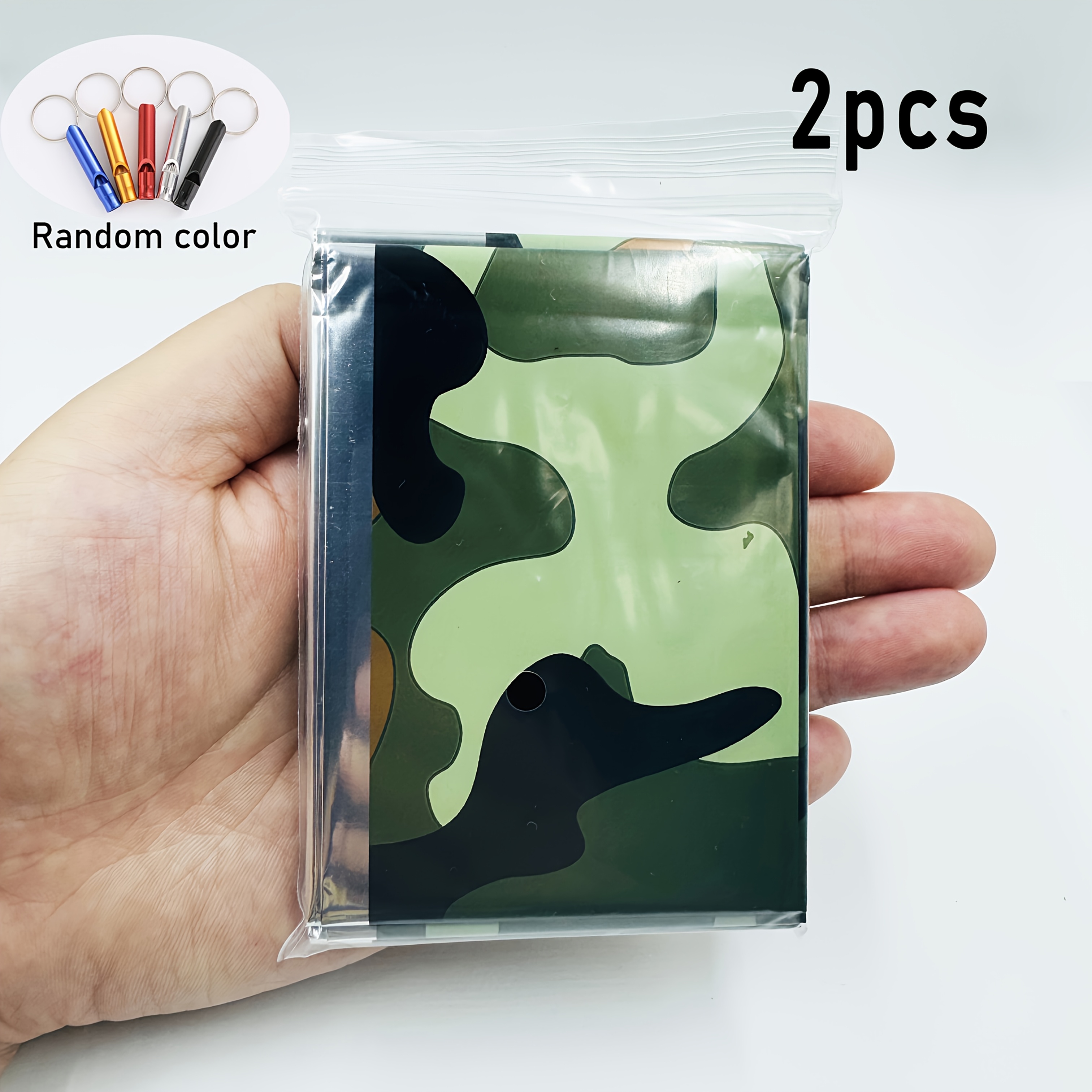 2pcs Set Camo Survival Blankets + Whistle 90% Windproof Heat , Solar Reflective, Compact & Reusable For Camping, Hiking.