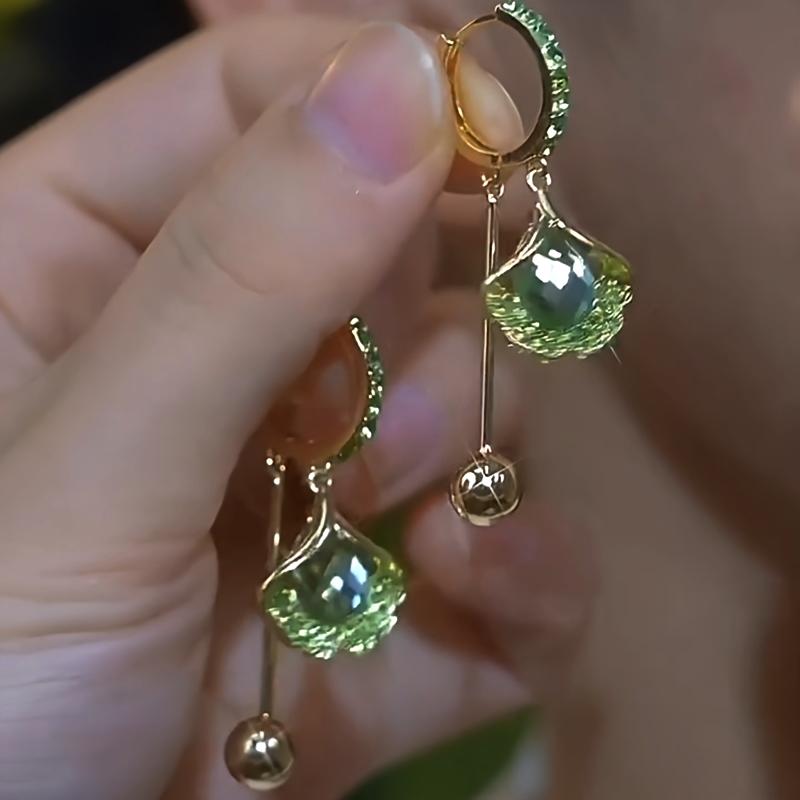 A Pair of Stylish Light Luxury Rhinestone Embellished Ginkgo Leaf and Round Ball Ear Cuffs