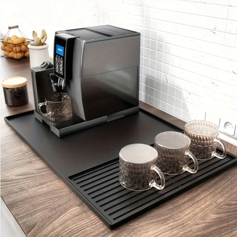 A 2-In-1 Silicone Coffee Mat with Raised Edges, Measuring 59.94cm X 39.88cm, Designed to Protect Coffee Bar Countertops. It Is Suitable for Coffee Machines, Espresso Machines, And Dish Drying Mats, Featuring a Non-Slip Design And a Removable Absorbent Pad. This Multifunctional, Heat-Resistant Kitchen Accessory Also Adds Decorative Appeal.