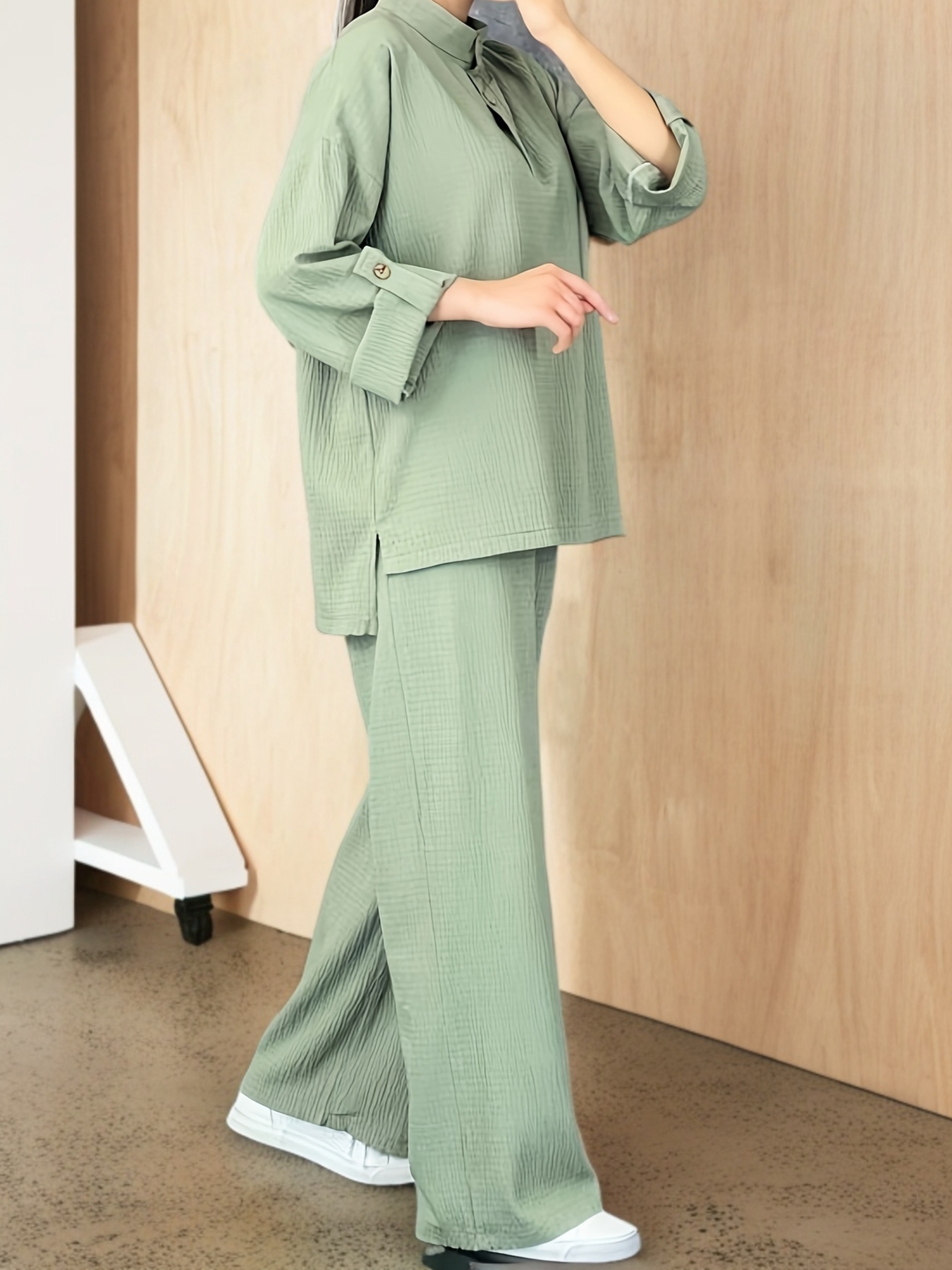 Effortless Chic Two Piece Pants Set in a flattering modern silhouette The set features a comfortable top and coordinating pants perfect for a chic and relaxed look