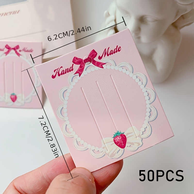 TEMU Ensemble de 50 cartes de papier décoratives avec un nœud et un design , idéal pour présenter des bijoux, des élastiques à cheveux et des