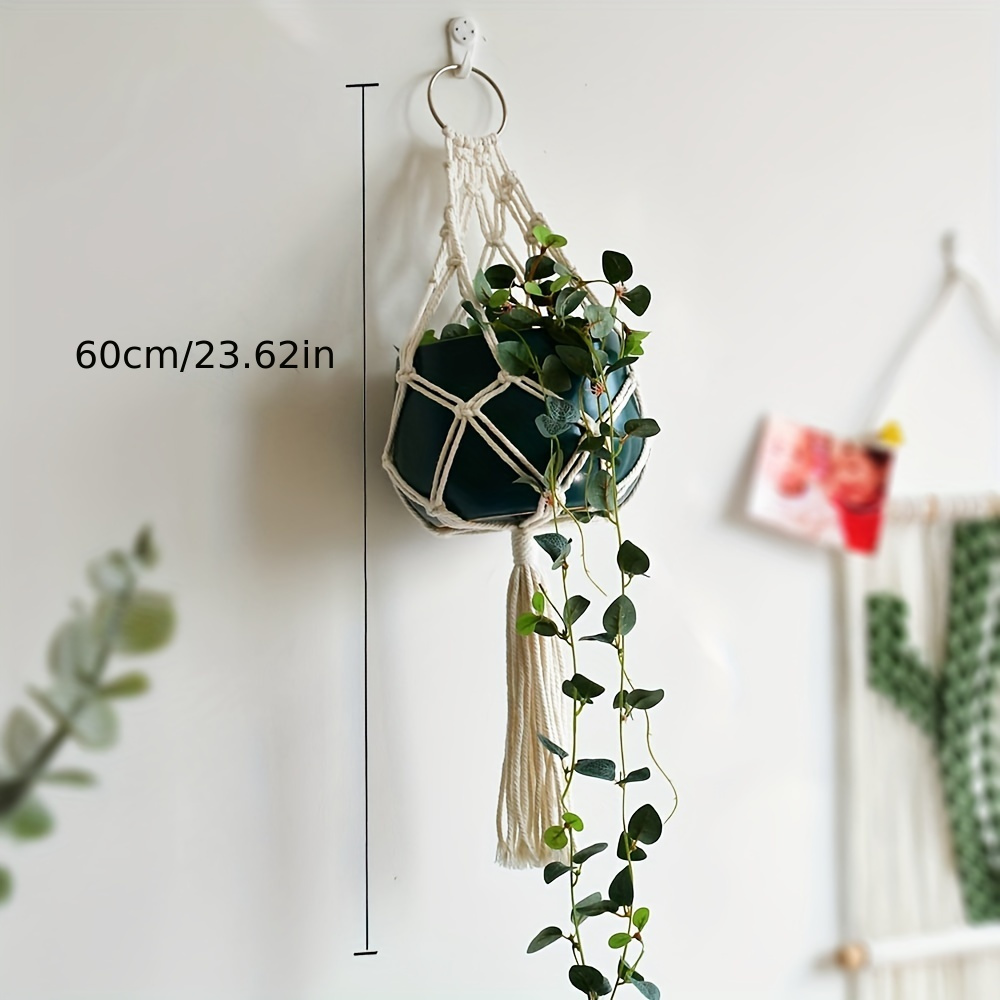 A Single Handmade Macrame Pot Holder Designed For Indoor Use, Perfect For Hanging Small Plant Pots On The Wall