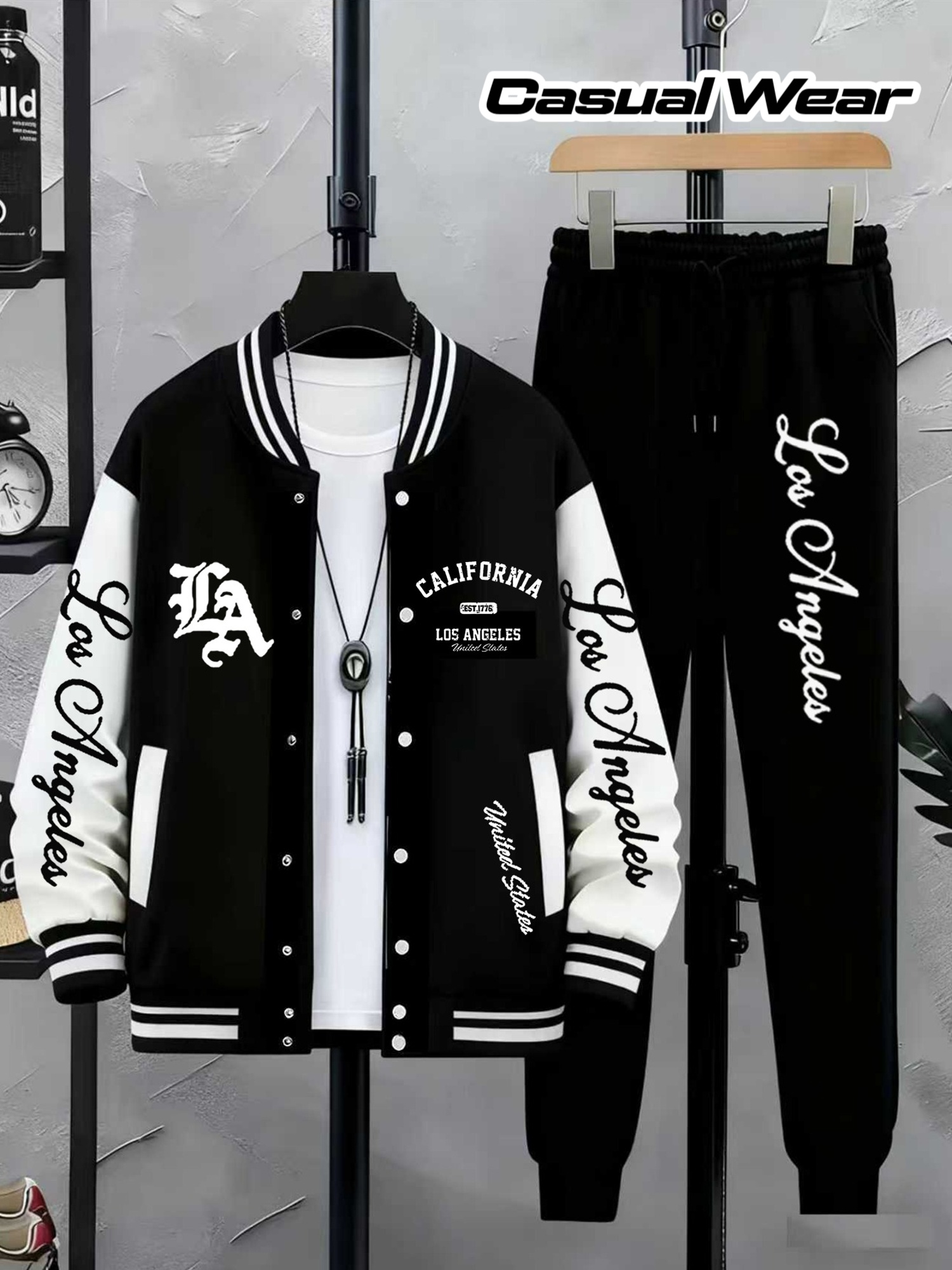 A Stylish Two-Piece Set for Men Featuring a Baseball Jacket with LA Lettering Print, Capturing The Trendy Essence of Los Angeles, Paired with Casual Fashionable Long Pants.