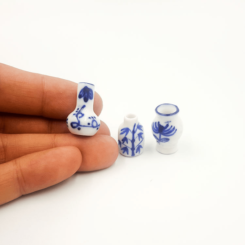 Figurines de pot de fleur de poupée en céramique peint à la main