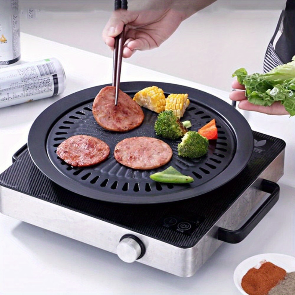 https://img.kwcdn.com/product/iron-smokeless-barbecue-grill-pan/d69d2f15w98k18-6187b903/open/2023-11-02/1698890233503-877ee4a0a75e4a758e5754100a1ff719-goods.jpeg