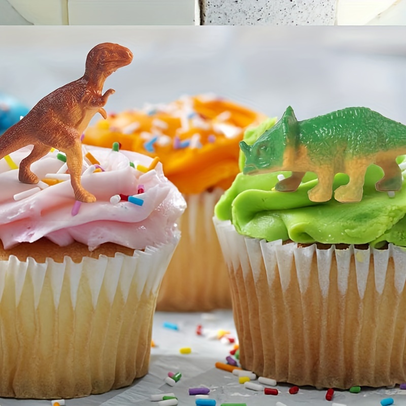 Mini-mini Candy con motivo de dinosaurios en colores vivos para celebrar el  primer añito de George. Este montaje, torta y dulces pertenece…