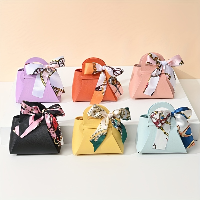 Bolsa de regalo pequeña con asas, lazo, cinta de papel a rayas, bolso de  mano, galletas