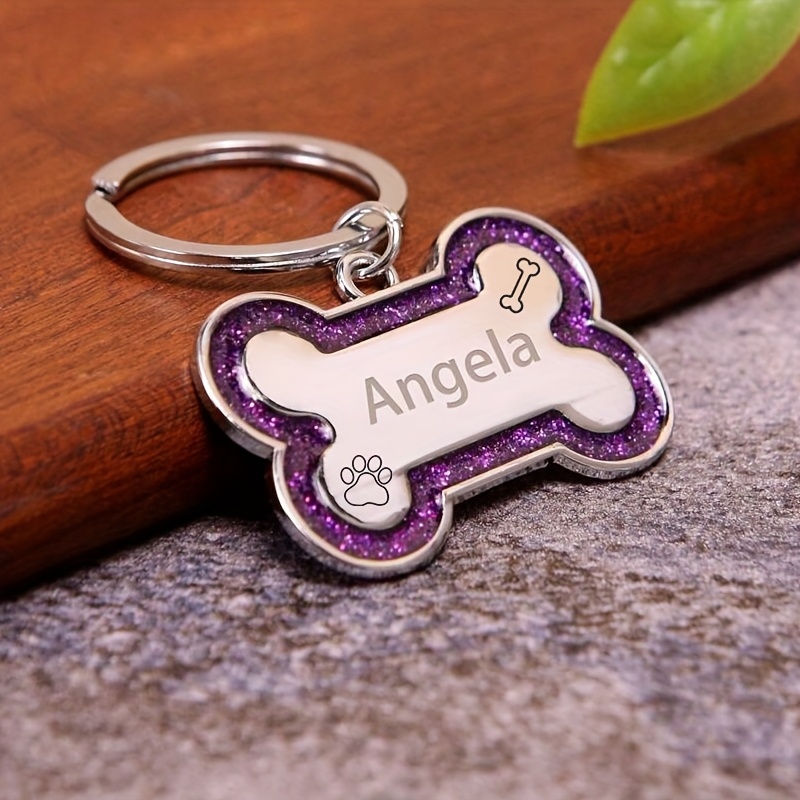 TEMU This Customizable Double-sided Pet Id Tag, Shaped Like A Bone, Features A Sparkling Paw Print Design, Engravable With Your Pet's Name, Phone