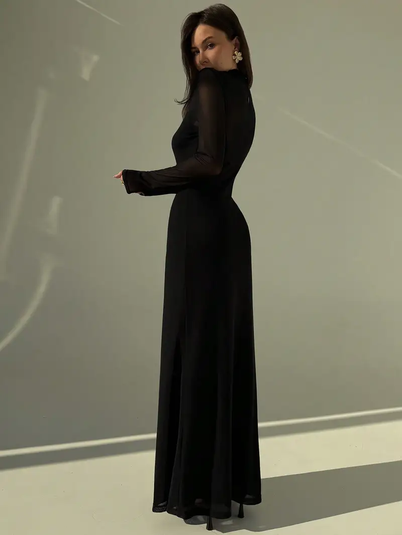 ultra sheer black dress Dakota Johnson Just Made The Sheer Trend Even More Sheer With A Gorgeous Gothic Black Dress