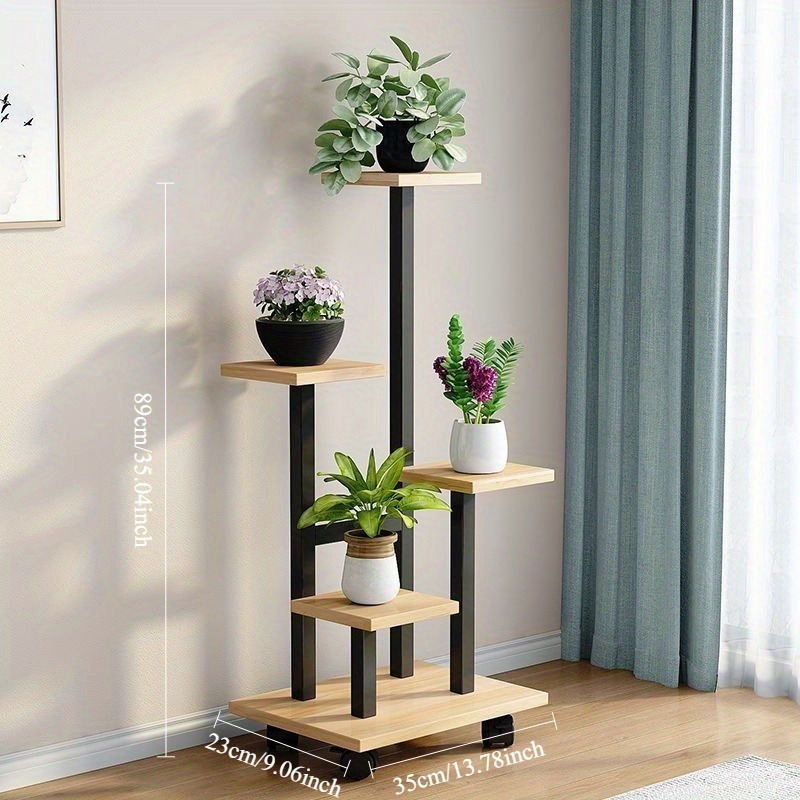 A 4-Tier Metal Plant Stand with a Wooden Top, Multi-Layered Flower Rack - a Sturdy Multi-Level Plant Shelf for Indoor/Outdoor Use, Suitable for Home, Garden, And Patio Decoration - a Space-Saving Storage Rack for Potted Plants, Gardening Tools, And More, Featuring a Durable Structure, Modern Organizer, High-Quality Materials, And Designed for Home Garden Organization And Balcony Gardening.