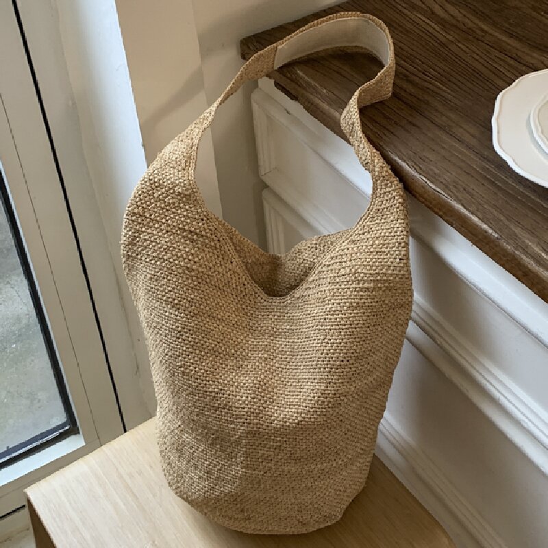 Image of Fashionable 2026 New Bucket Bag Grass Handmade Needle Hook Straw Weaving Tote Bag Versatile Handheld Shoulder Bag