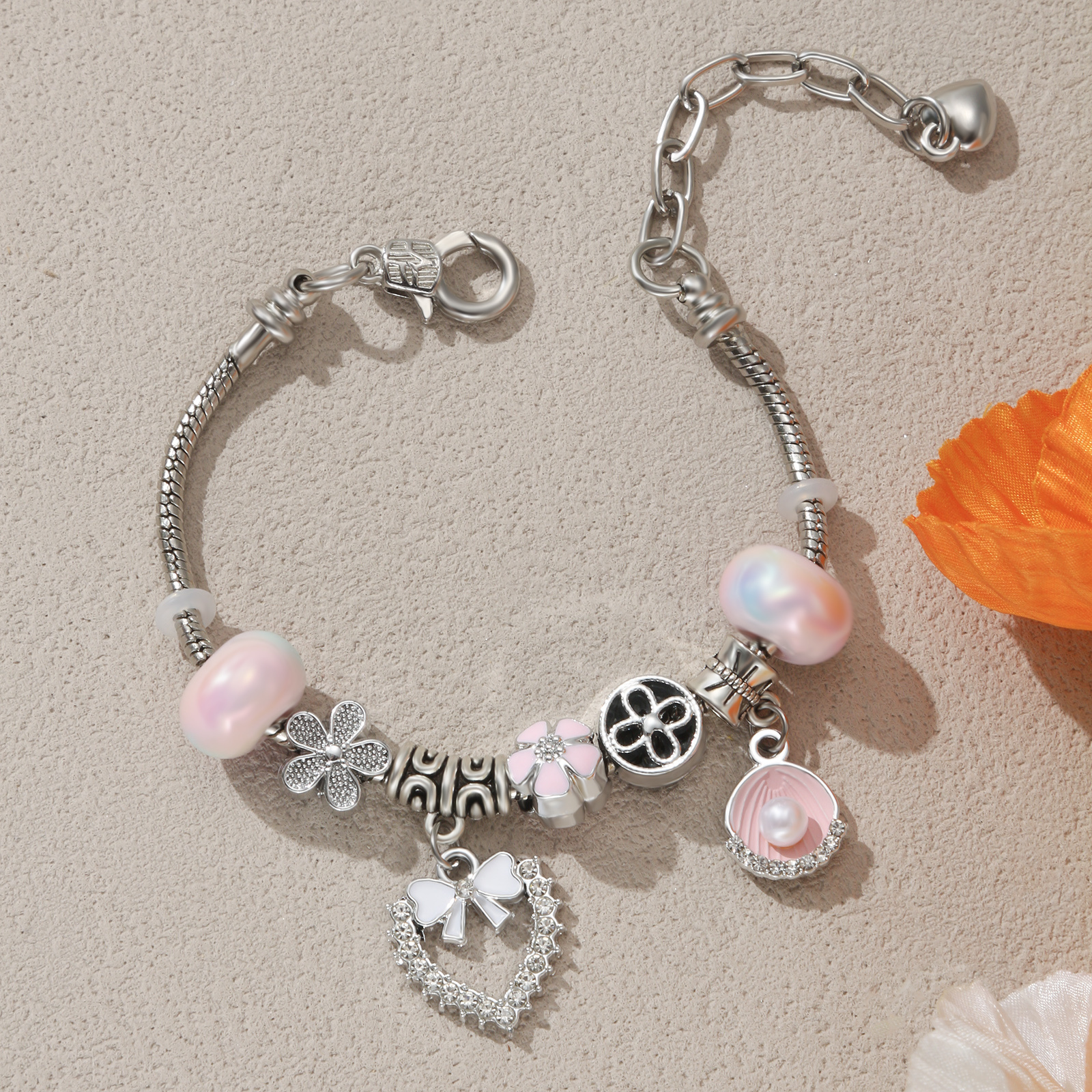 Image of Adjustable Jewelry For Women Featuring A Silvery Charm Bracelet With Pink Pearls, Shell Heart Pendants, And Synthetic Zirconia, Perfect As A Valentine's Gift
