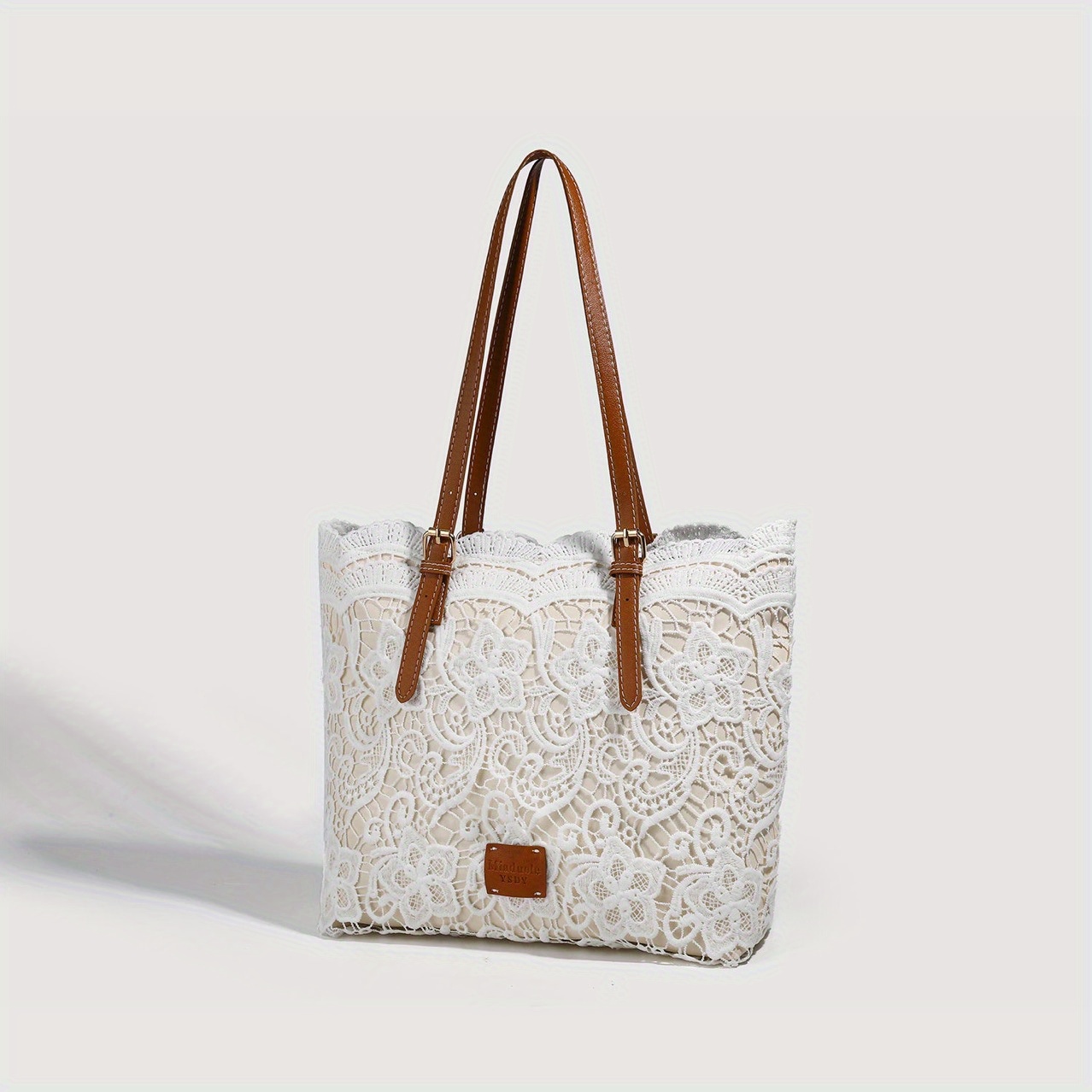 A 2025 New Lace Tote Bag, Featuring Heavy-duty Lace, a Spacious Interior, a Magnetic Snap Closure, and a Bucket-style Design. Soft and Foldable, It Makes a Great Gift for Mom. An Elegant Everyday Commuter Shoulder Bag