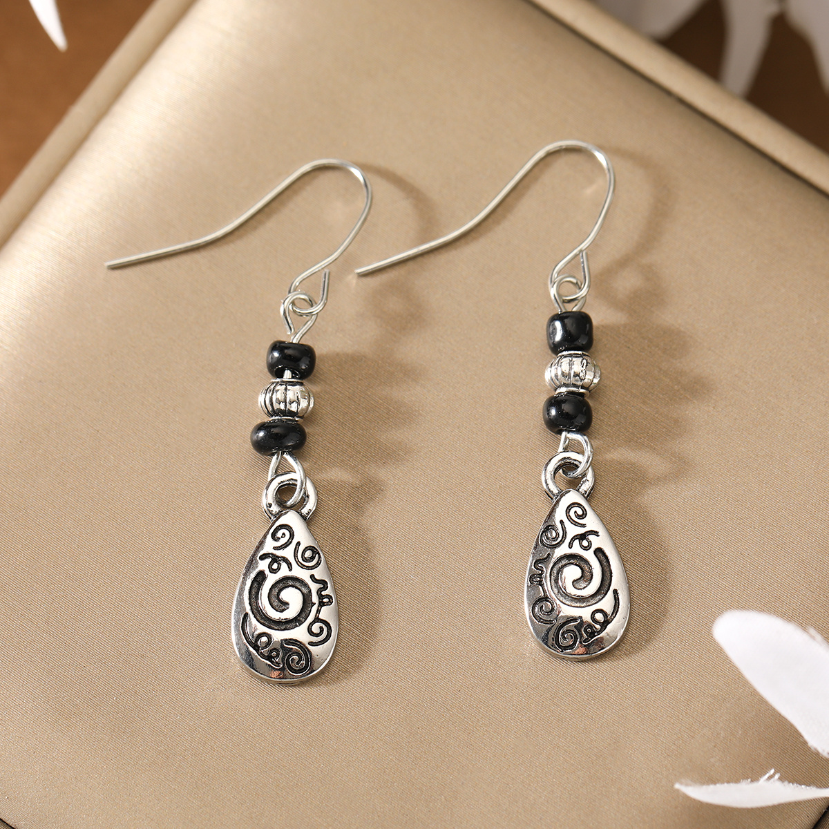 Image of Retro Ethnic Style Carved Distressed Scroll Water Drop Pendant Women's Earrings Daily Outfit Casual Party All-match Ear Jewelry