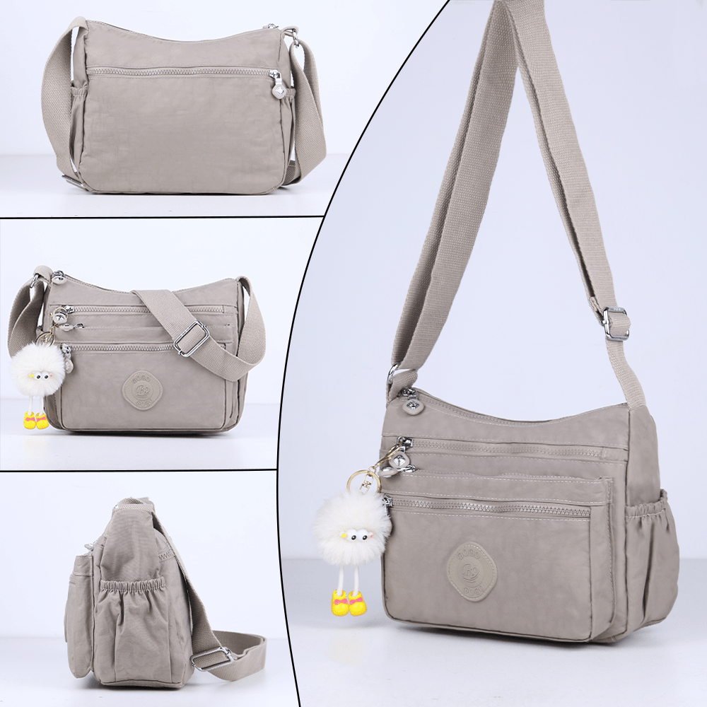 stylish lightweight multi pocket unisex crossbody bag with pendant elegant durable womens shoulder bag sturdy anti theft womens crossbody bag durable fabric multiple compartments adjustable straps perfect for travel daily use commuting Product details 4