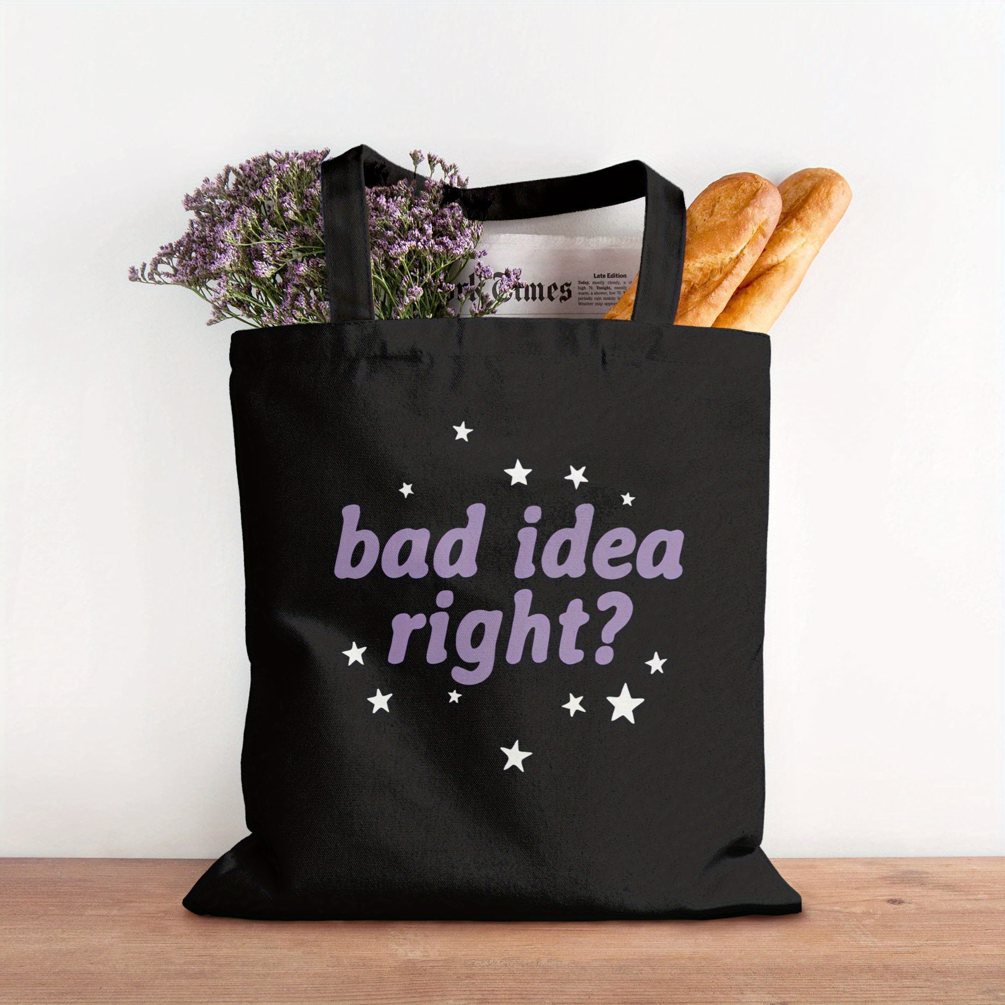 TEMU 1pc 2d Flat Printing, Bad Idea Right Tote Bag- Black Canvas Shoulder Bag With Purple , "bad Idea Right?" Text Design, , Everyday Tote Bag|
