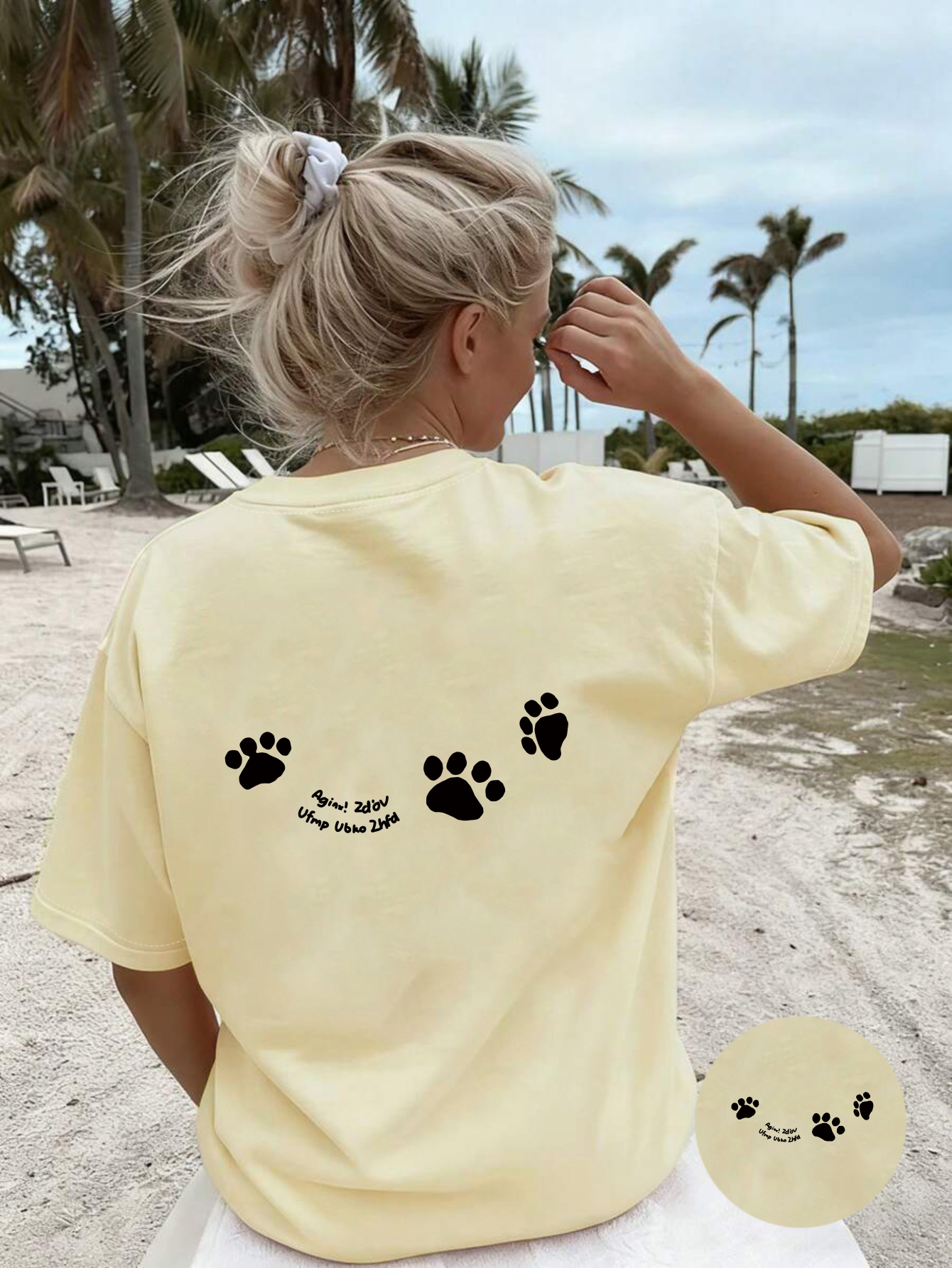 spring and   featuring a round neck short sleeve tee   with an adorable paw print design on the back   casual and versatile wear