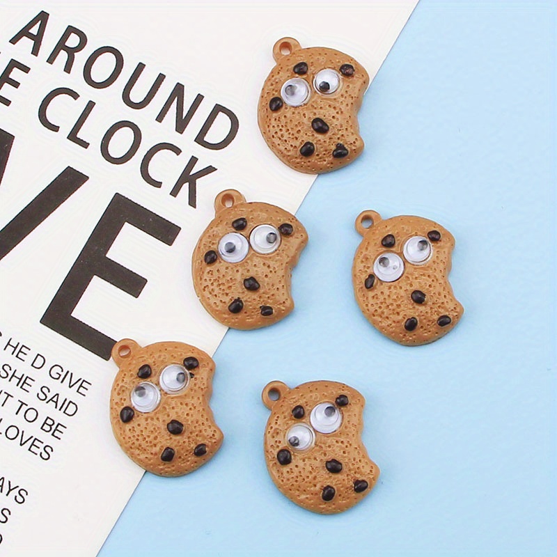 5pcs Cookie Elf Charms - Resin   for Phone Cases, Hair Ties, Earrings, Water Bottles & More - Whimsical Cartoon Design with Big Eyes &   -   Crafting & Decorating, Phone Case Charms |   Eyes Design | Brown Resin Material, Charms for Phone Case