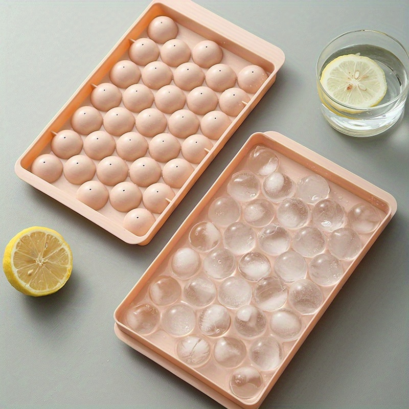 set of 2   molds designed for making ice hockey shapes featuring a 33 grid design this innovative   mold   with a lid making it a must have for   preparation and cold beverage accessories   details 7