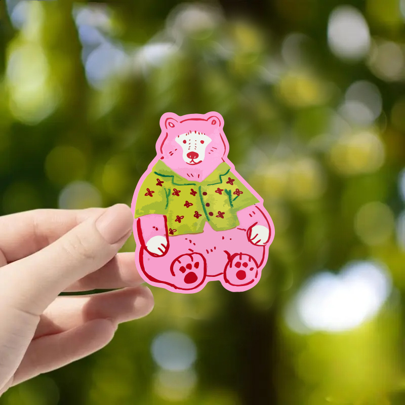 item picture Cute Pink Bear with Green Floral Shirt Sticker, Hand-drawn Cartoon Animal Creative Sticker. Suitable for Computers/mobile Phones/laptops/water Bottles/bicycles/cars/suitcases/skateboards|   Stickers