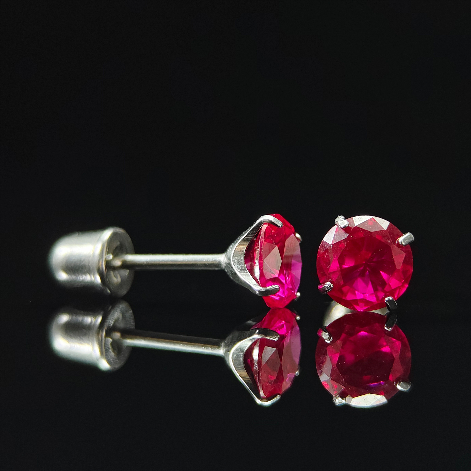 Women's 0.5/2 Carat Four Prong Red Artificial Stone Earrings