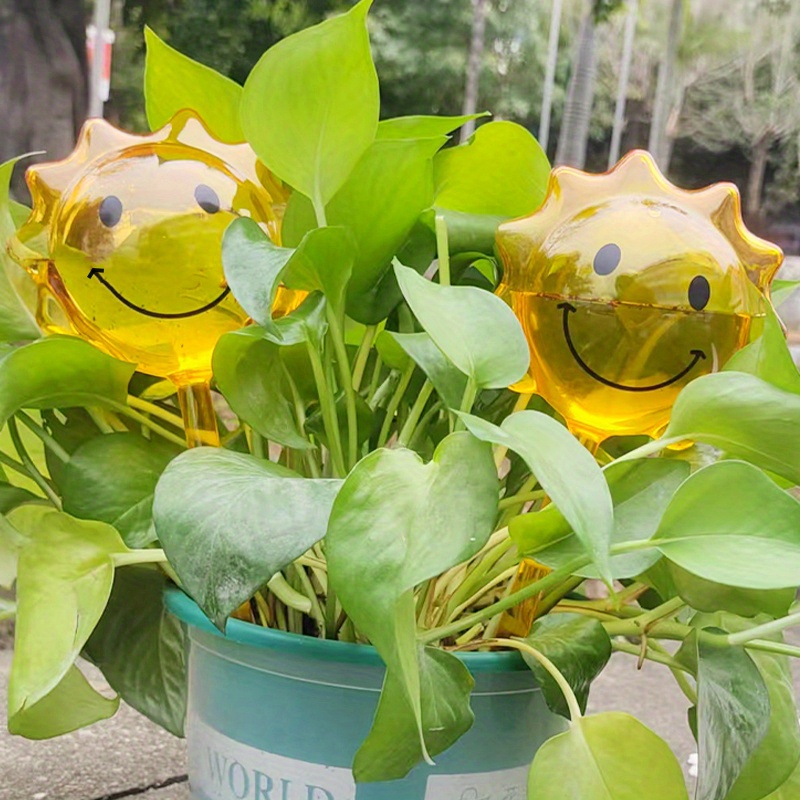 Image of Set Of -shaped Face Self-watering Stakes Made Of Durable Plastic, Designed For Reusable Watering Of Potted Plants To , Ideal For Garden Use | Decorative Plant Globes