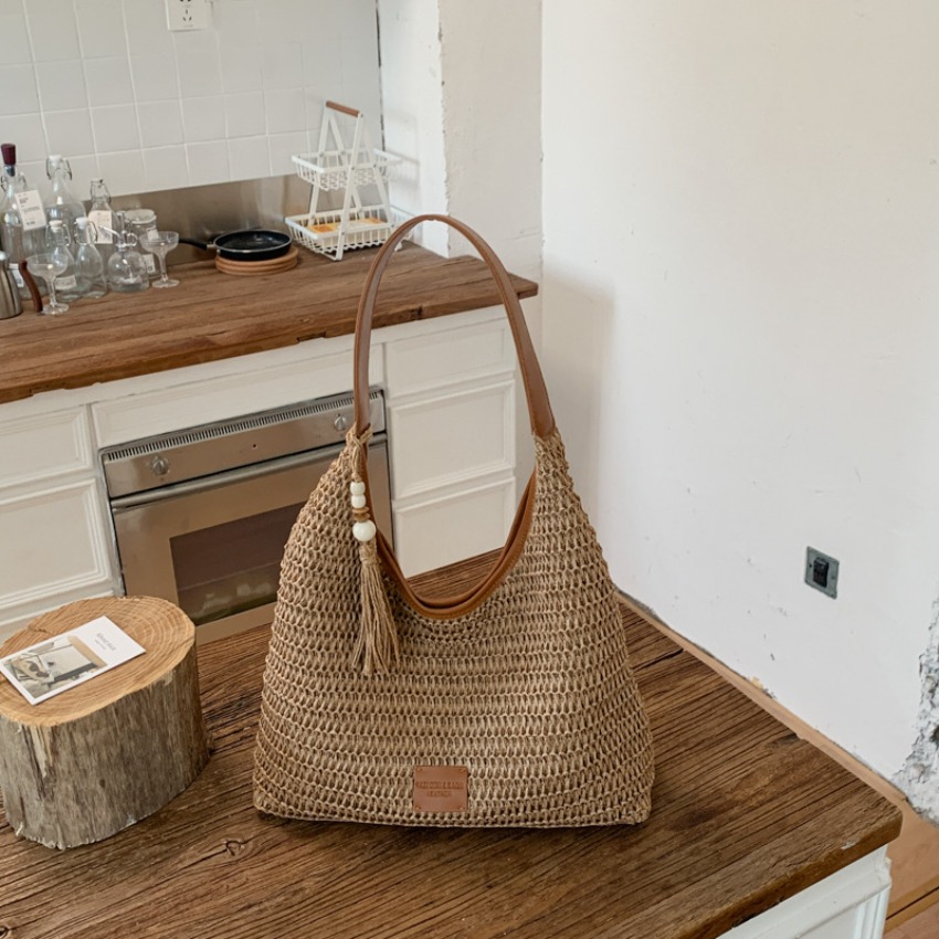 Image of Hollow Straw Woven Bag Women's 2026 Summer New Woven Shoulder Armpit Bag Large Capacity Vacation Beach Bag