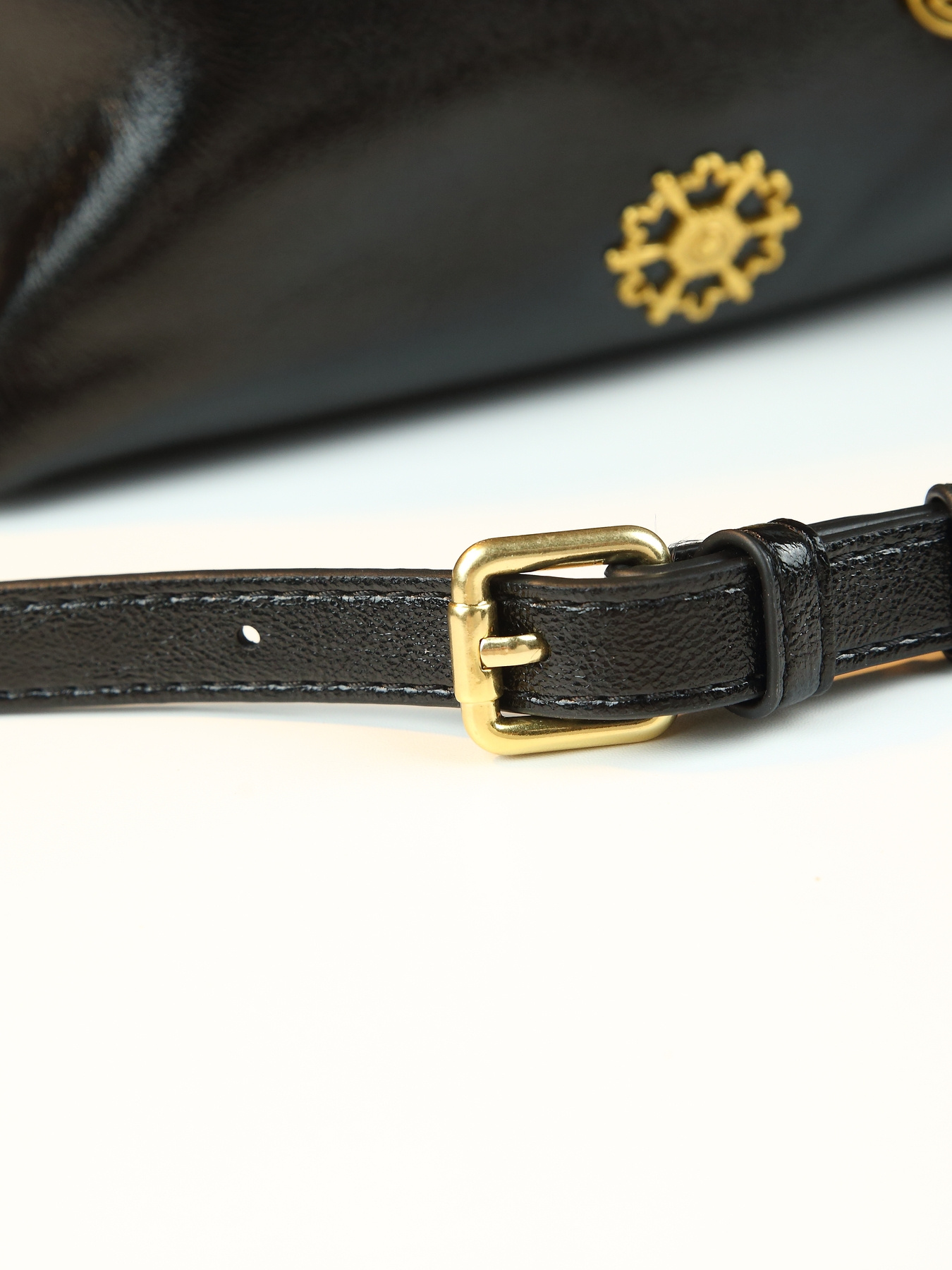 Black Drawstring Handbag side detail with hardware