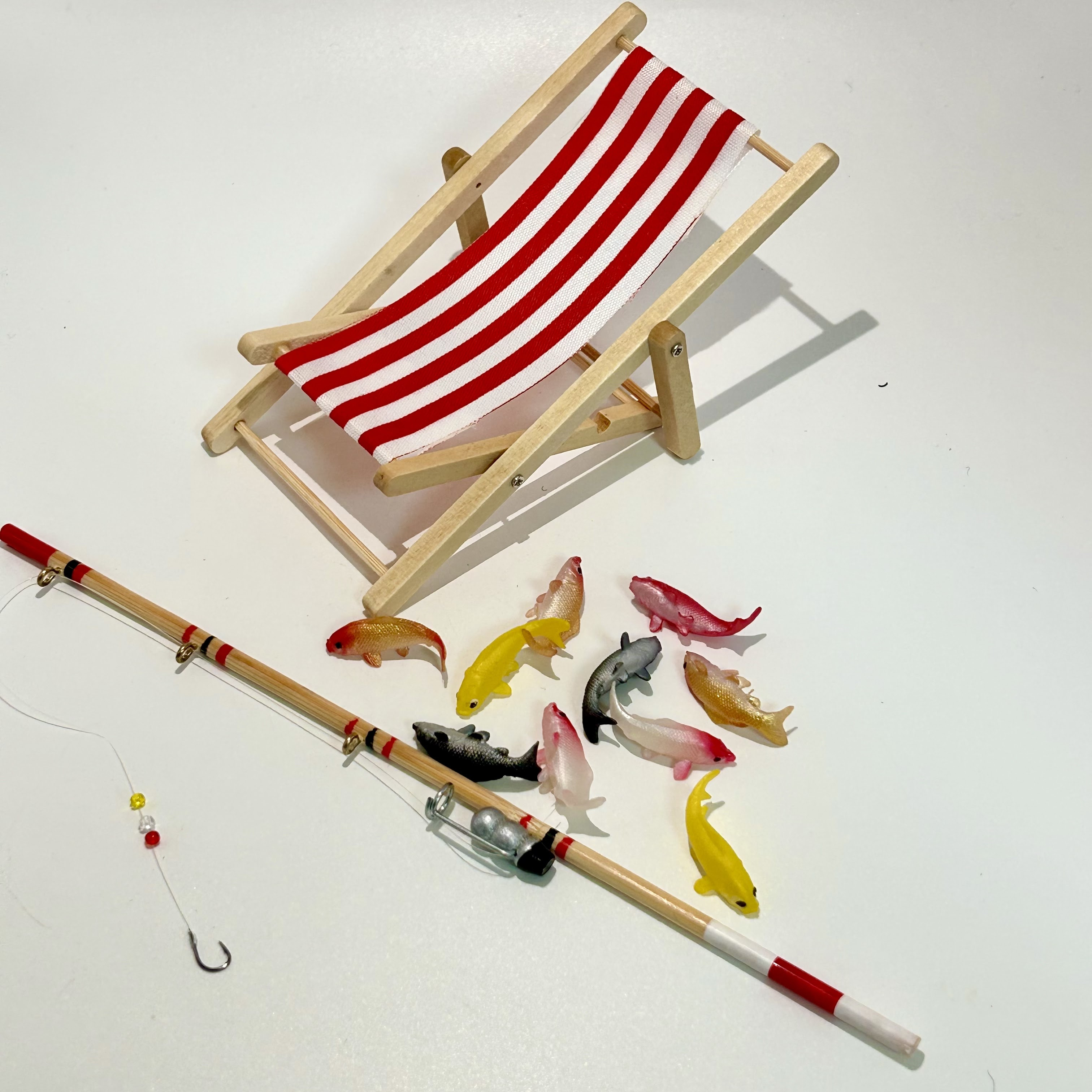 10pcs dollhouse fishing set   realistic miniature fish a fishing rod and a beach chair     an adorable pretend fishing scene