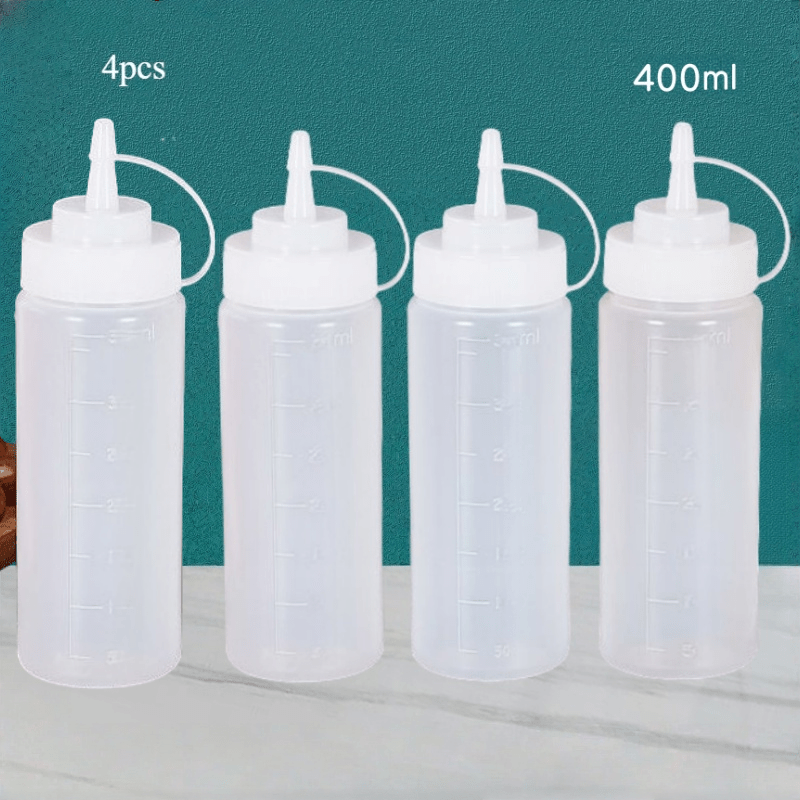 Image of 4pcs Salad Squeeze Sauce Bottle, Honey Oyster Sauce Seasoning Bottle, Milk Squeeze Bottle, Seasoning Bottle, With Scale, Transparent Leak Proof Squeeze Sauce Bottle, Festival Party Supplies, Tools