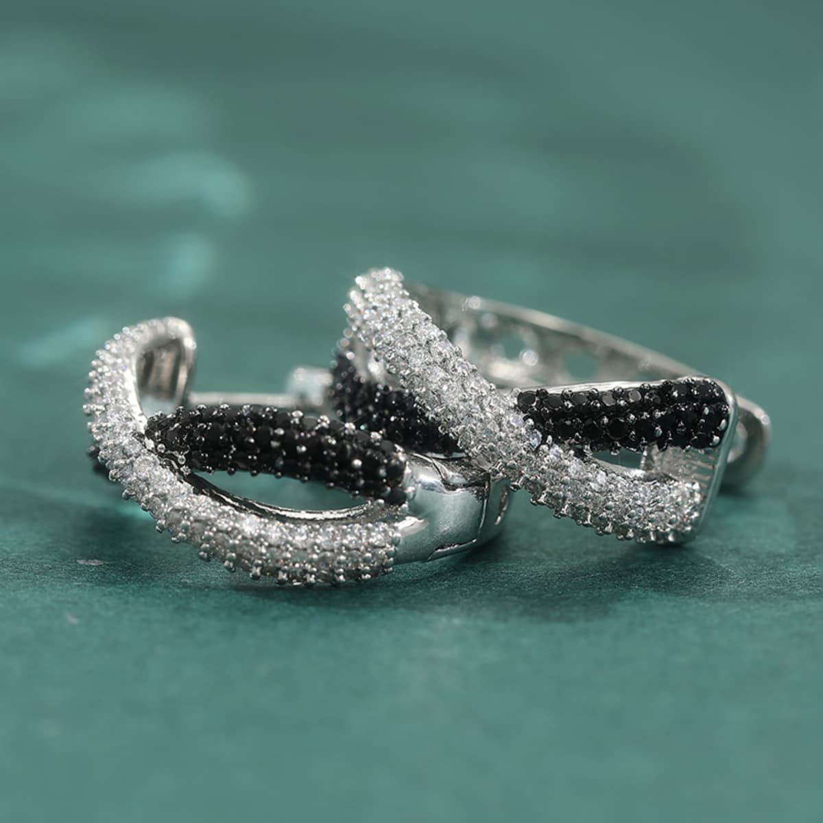 Women's Twisted Hoop Earrings with Black & White Zircon Pave