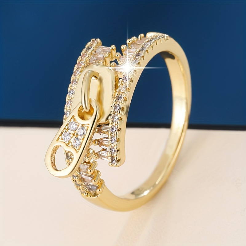 TEMU Un anillo elegante, con circonita cúbica sintética, base de cobre, baño único, diseño de cremallera elegante, adecuado para uso diario y para